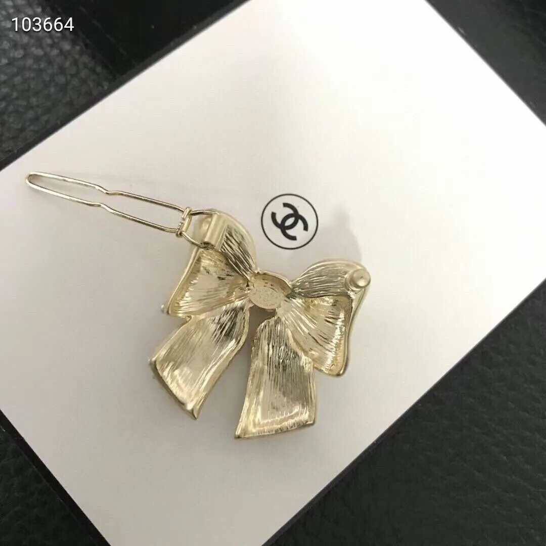 cc Brooch