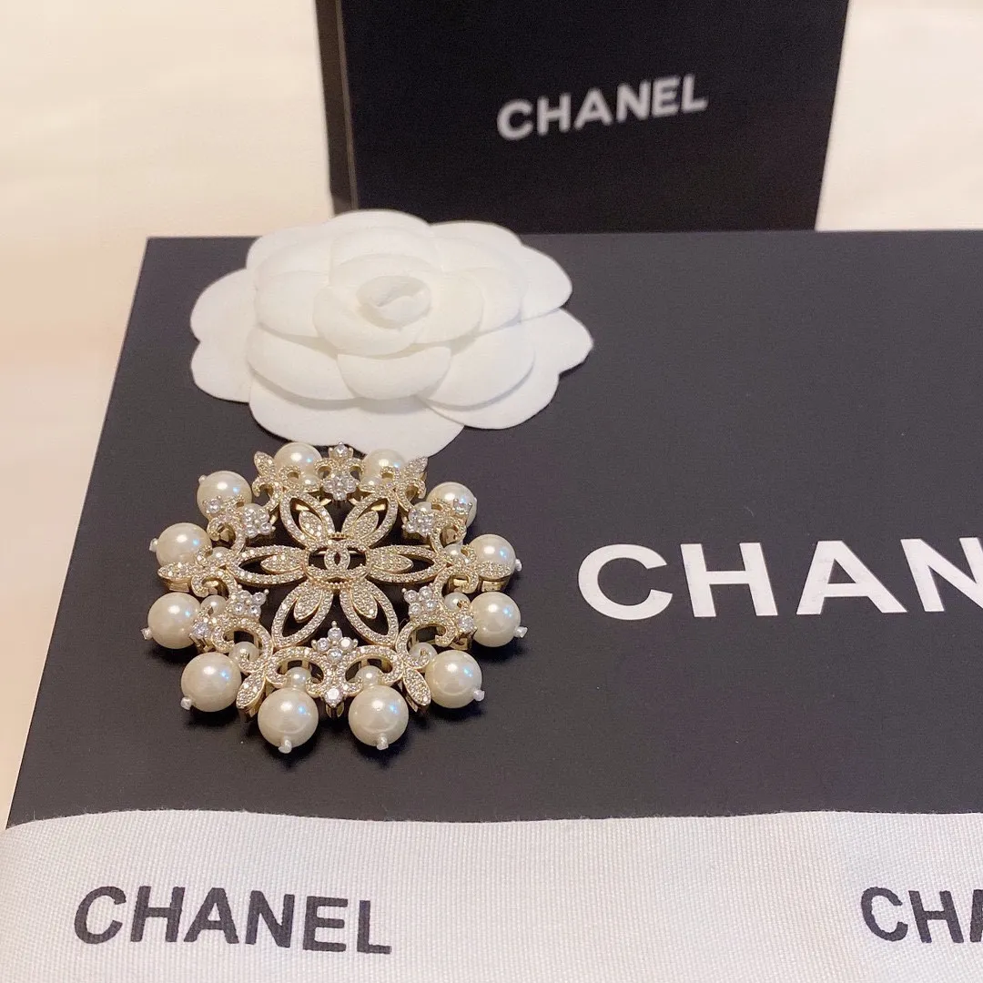 cc Brooch