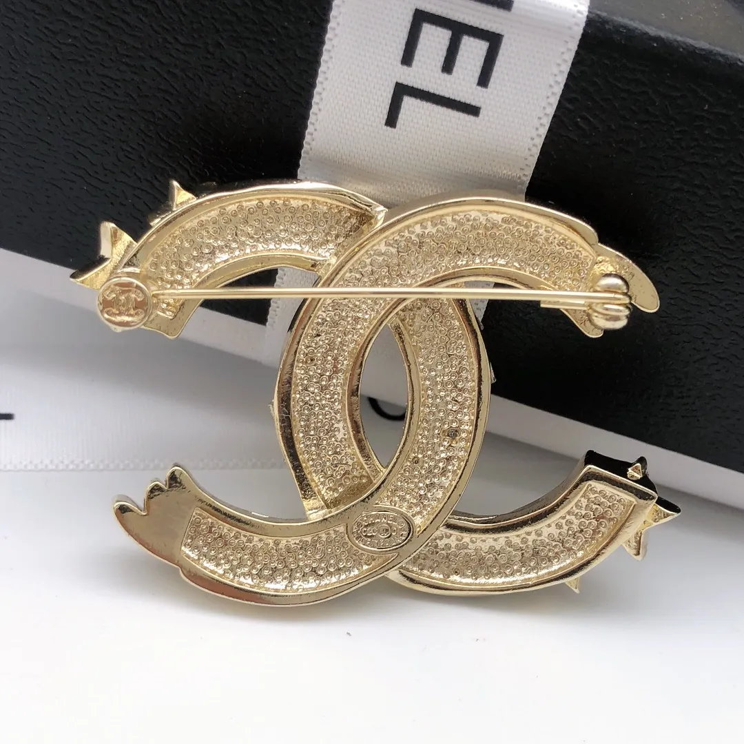 cc Brooch