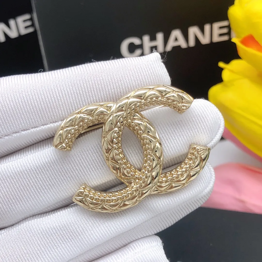 cc Brooch