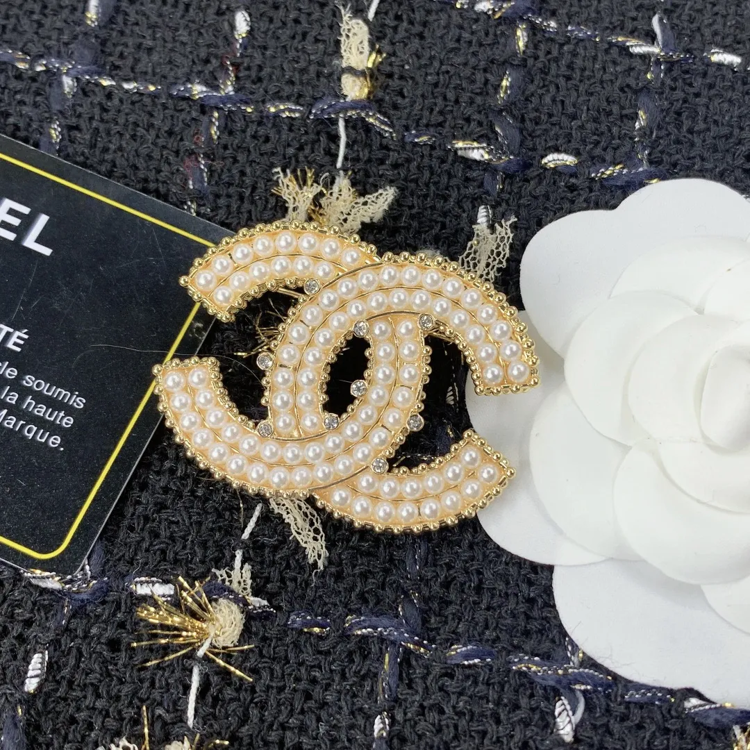 cc Brooch