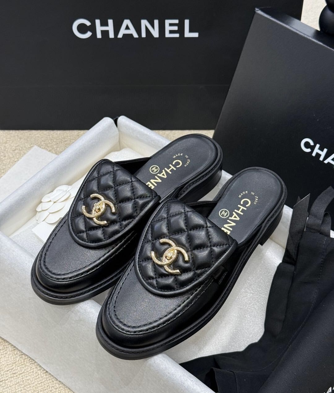 Chanel Leather mules & clogs