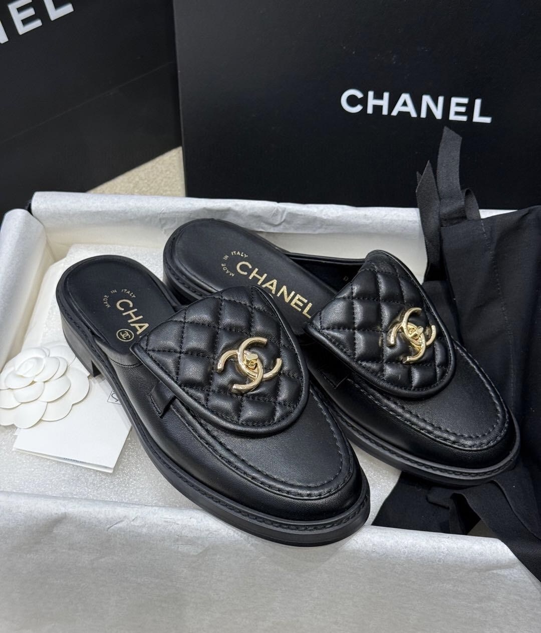 Chanel Leather mules & clogs