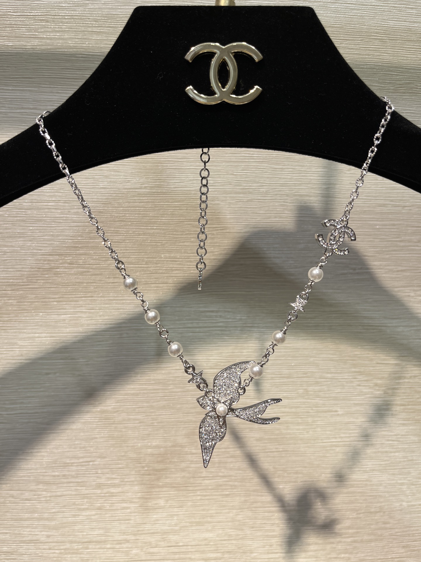 CHANEL 25S New Silver Bird-Inspired Double C Pearl Necklace
