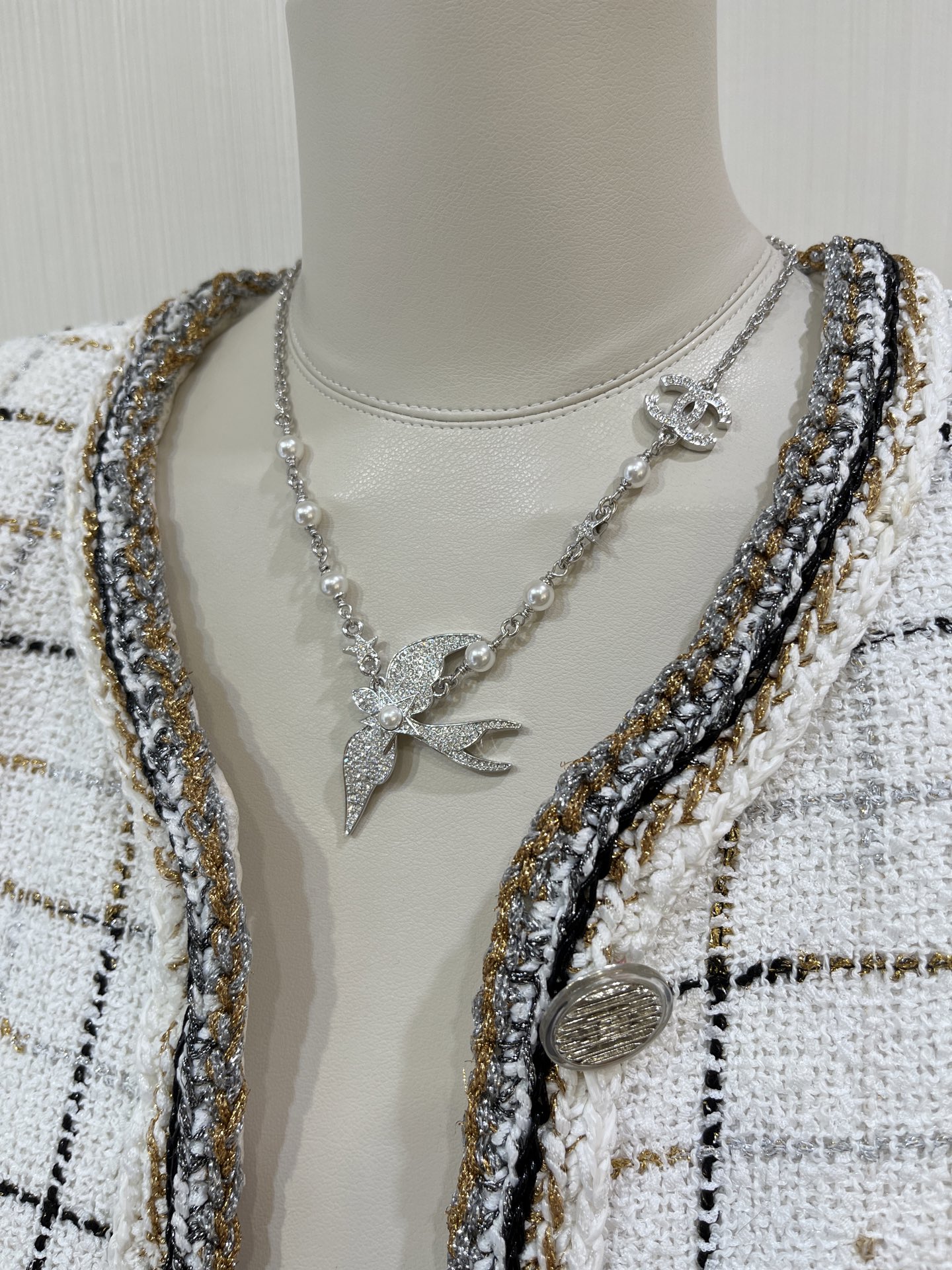 CHANEL 25S New Silver Bird-Inspired Double C Pearl Necklace