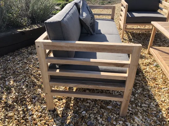 Teak garden sofa set with coffee table