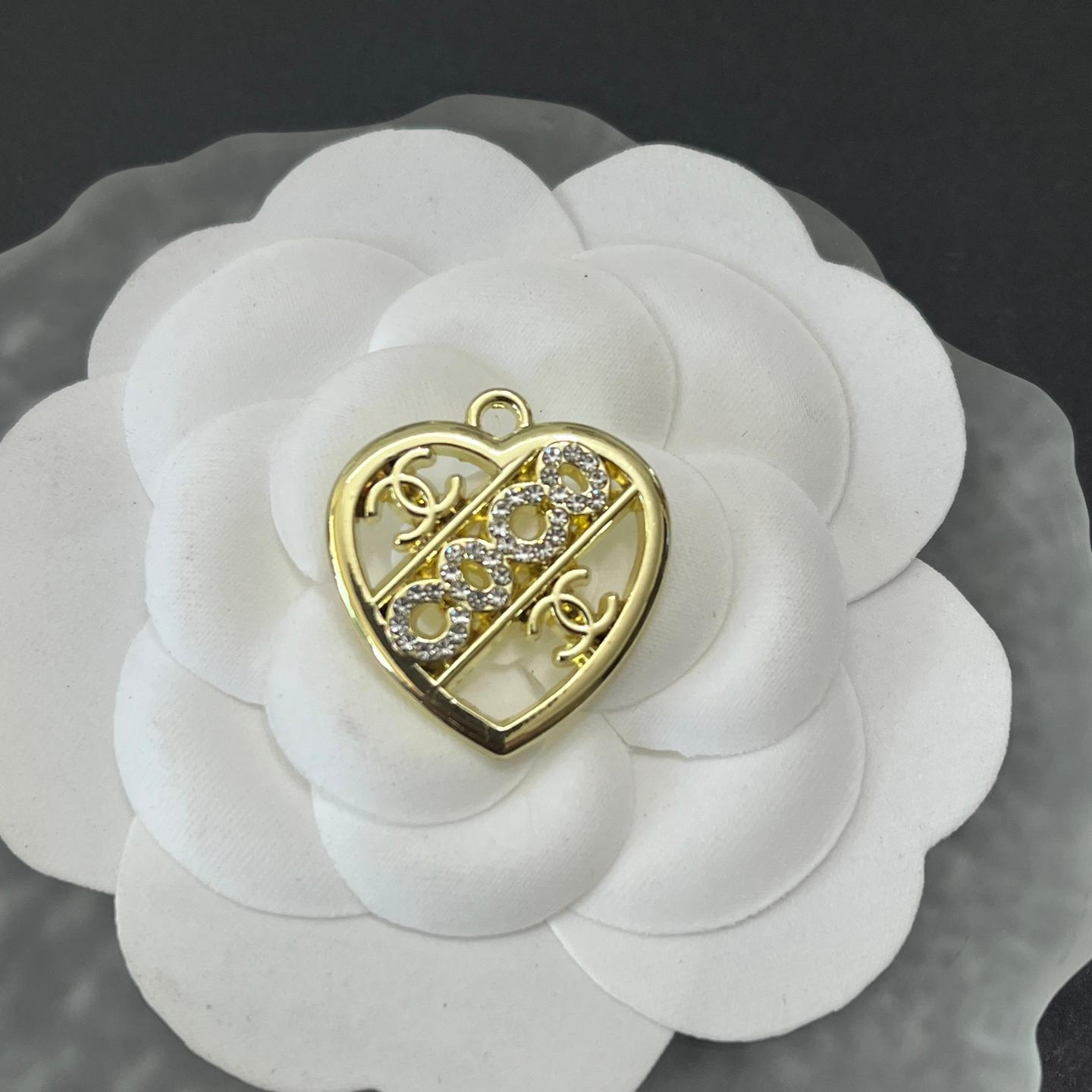 CC with lettered heart shape in the center 25MM*23MM