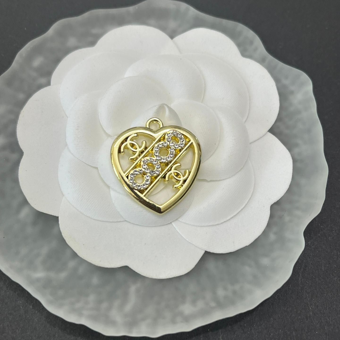 CC with lettered heart shape in the center 25MM*23MM