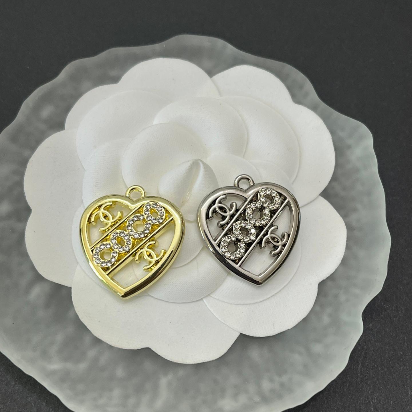 CC with lettered heart shape in the center 25MM*23MM