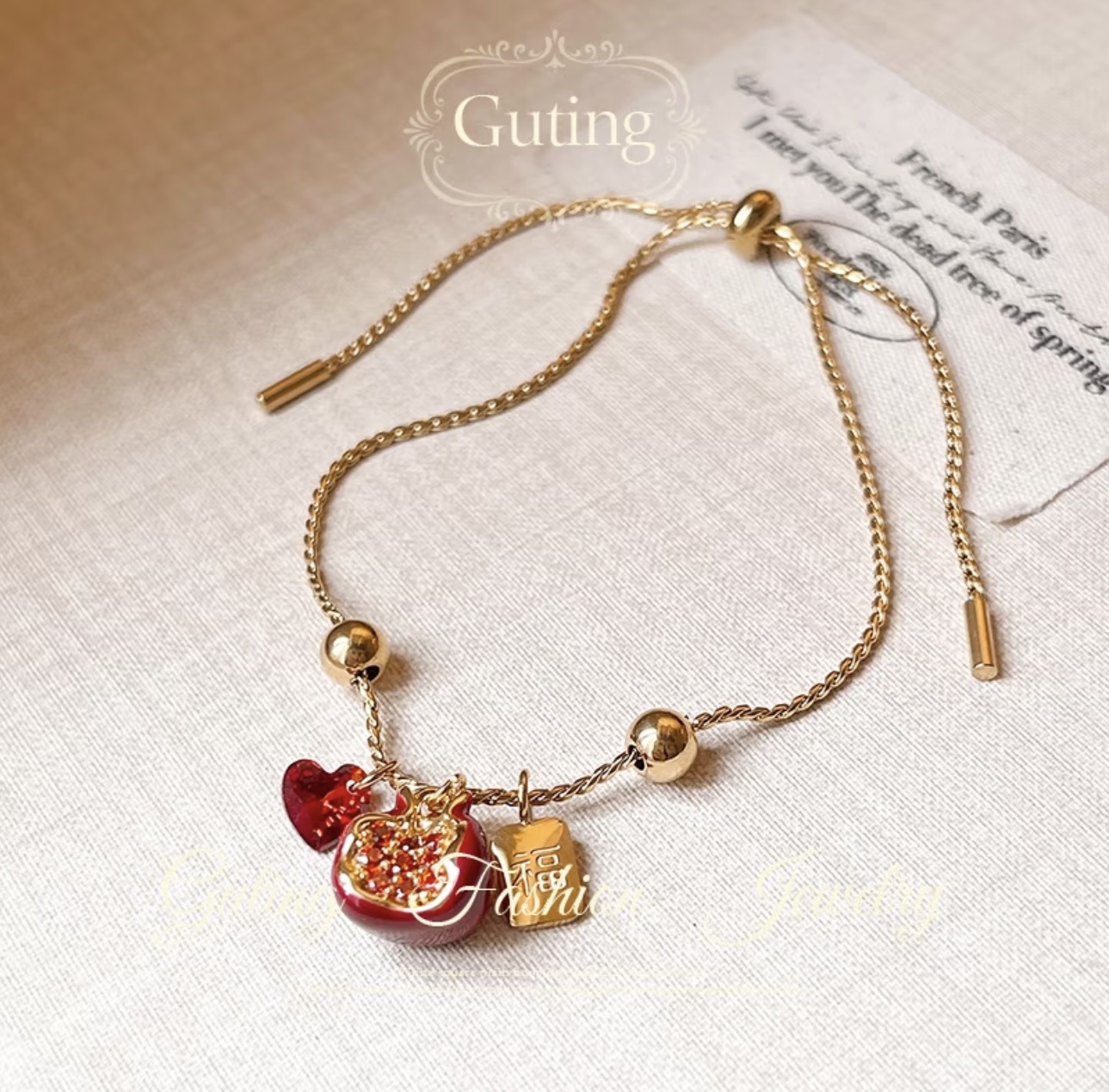 Red pomegranate heart-shaped rebranded bracelet for women, a high-end, light luxury new Chinese-style exquisite New Year's jewelry