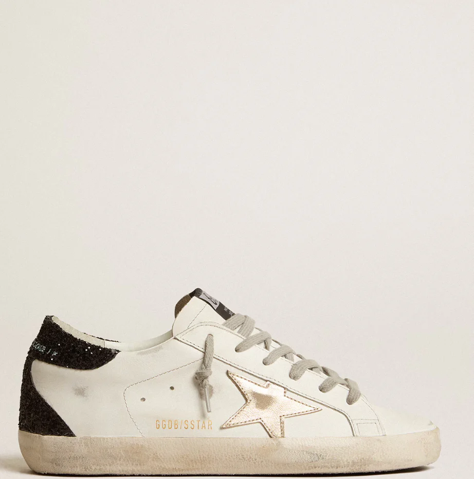 Super-Star Women with a gold star and black glitter reinforcement