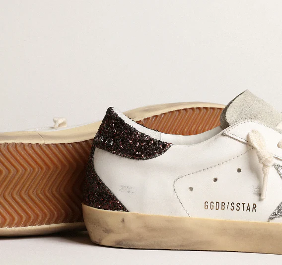 Super-Star with a silver star and brown glitter reinforcement