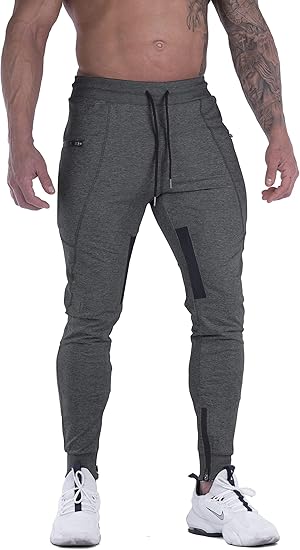 Men's athletic jogging pants, slim fit, suitable for fitness training, featuring mesh panels on the thighs and zippered pockets.
