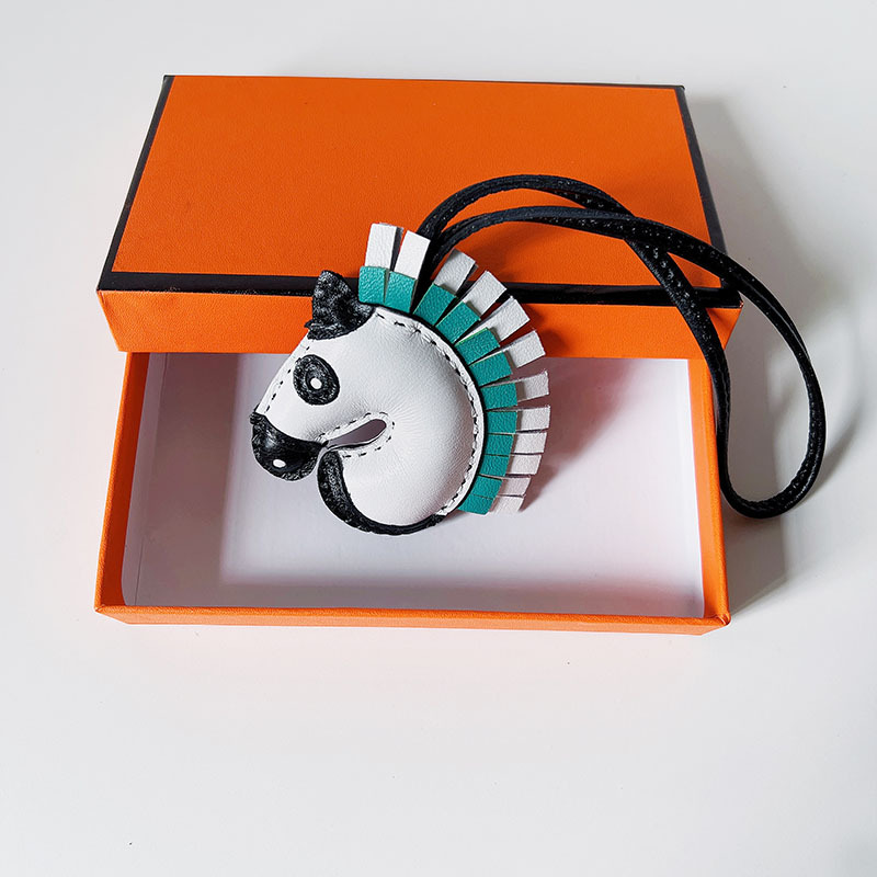 Handsewn unicorn pendant - Artisantouchss