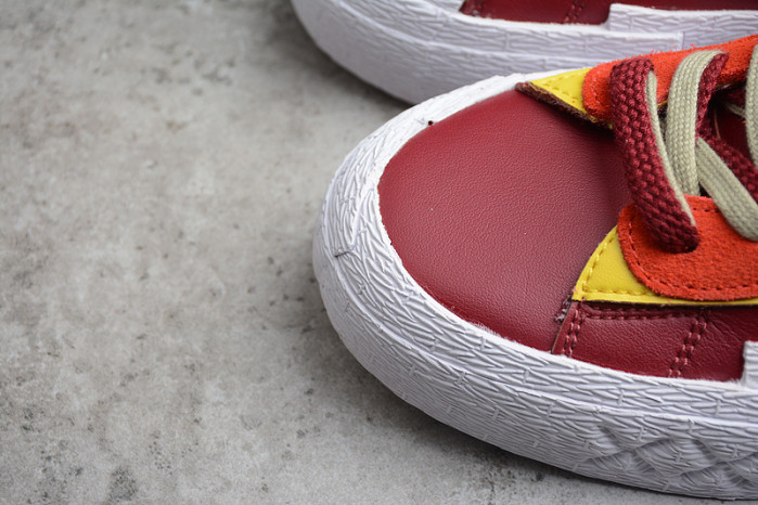 KAWS x sacai x Blazer Low Team Red DM7901-600