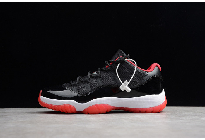 AIR JORDAN 11 RETRO LOW "BRED" BLACK/ RED mens 528895-012