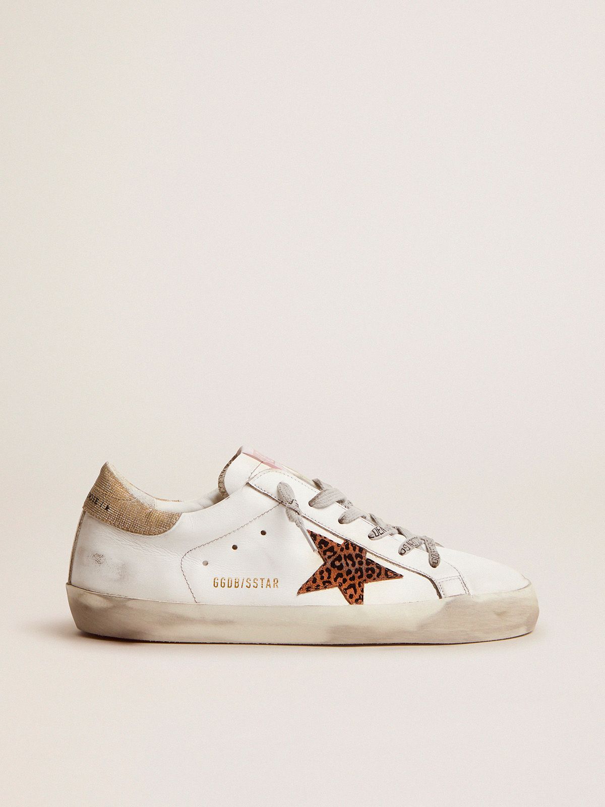 Sneakers Uomo Golden Goose Super-Star LTD sneakers with leopard-print star and gold glitter heel tab