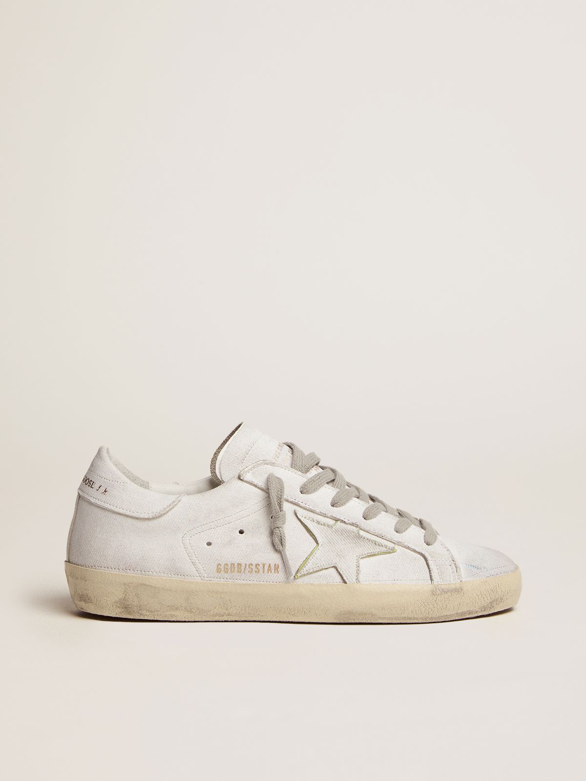 Sneakers Uomo Golden Goose Super-Star Dream Maker sneakers in white color with reverse construction and hidden multicolor details