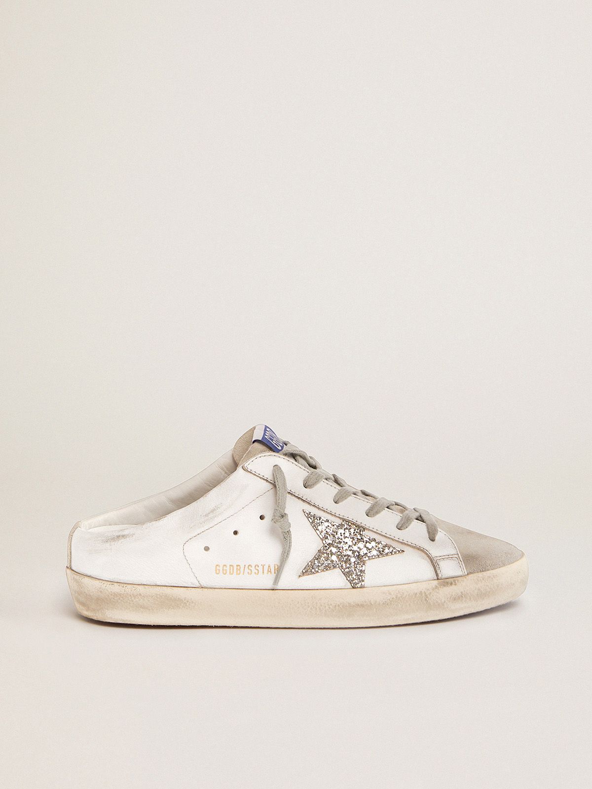 Super-Star Sabots in white leather and gray suede with silver glitter star