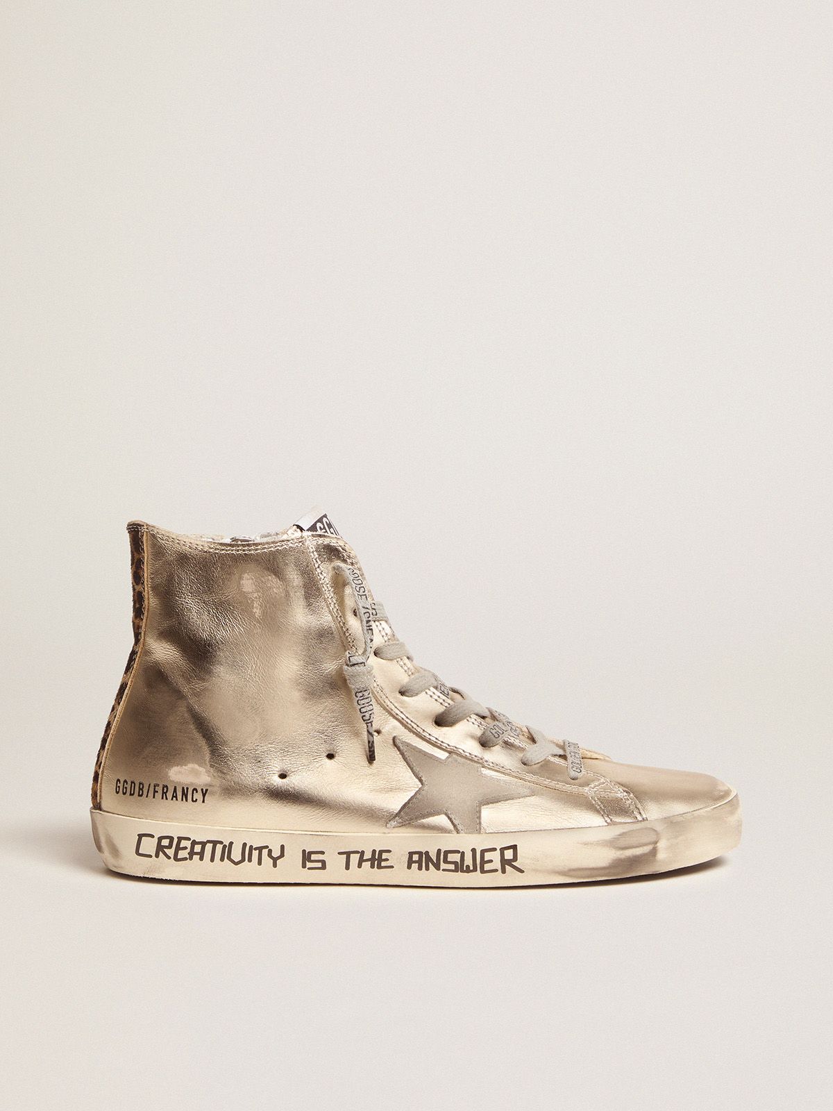 Gold Francy sneakers with handwritten lettering and leopard-print detail
