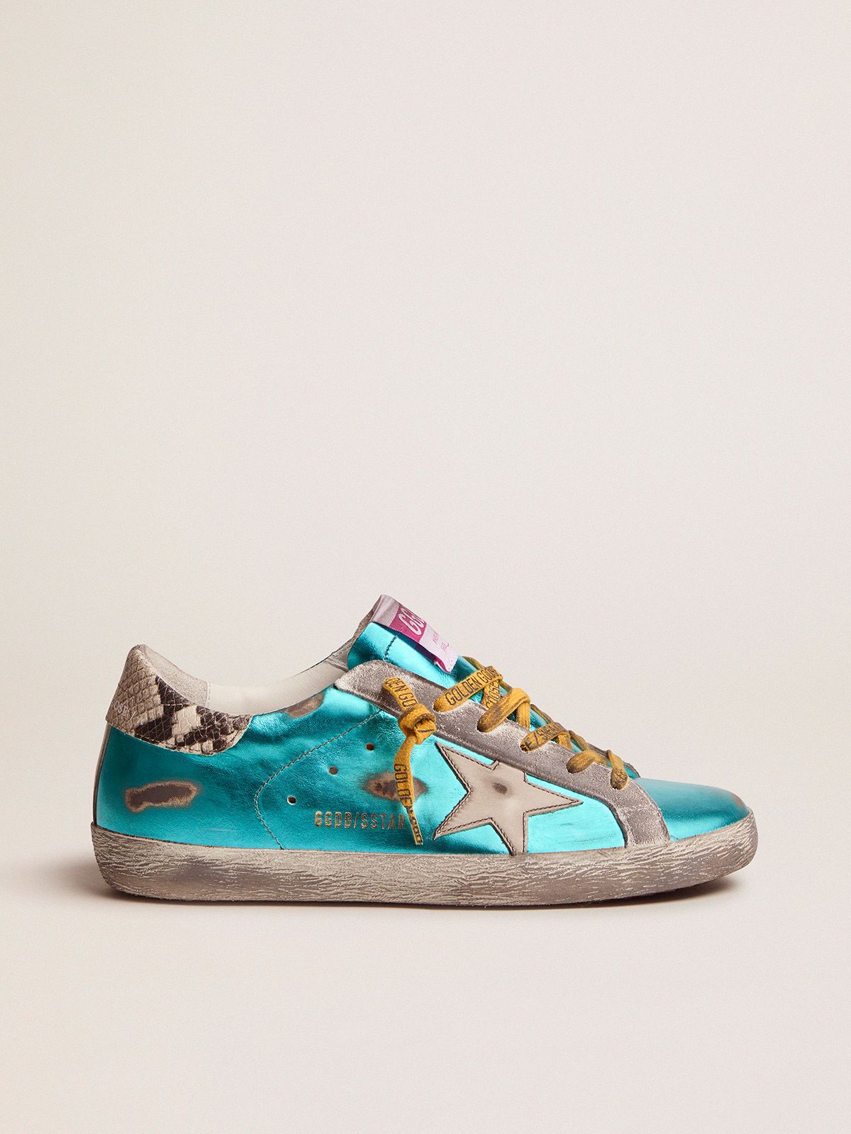Sneakers Uomo Golden Goose Turquoise green laminated Super-Star LTD sneakers with snake-print heel tab