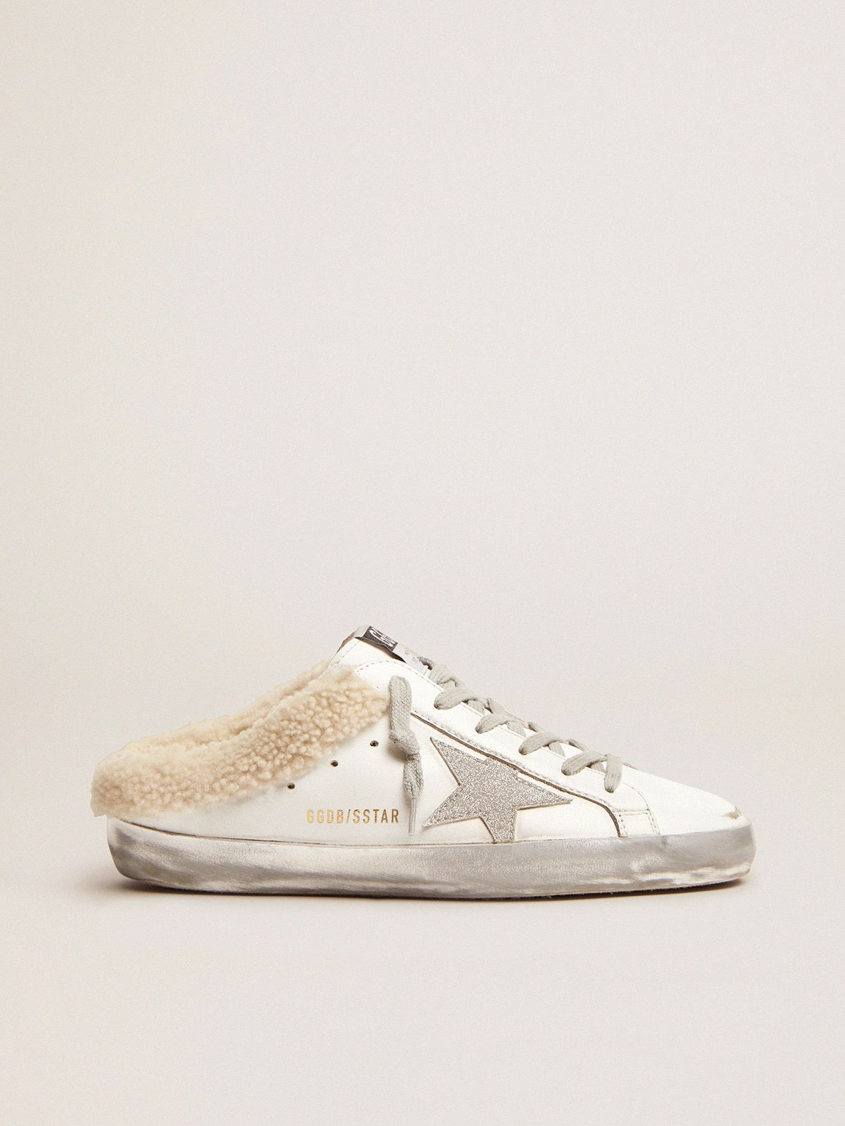 Super-Star Sabots in white leather with shearling lining