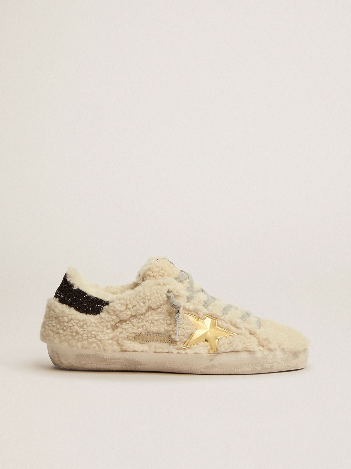 golden goose shearling Super-Star in 3D star gold with sneakers