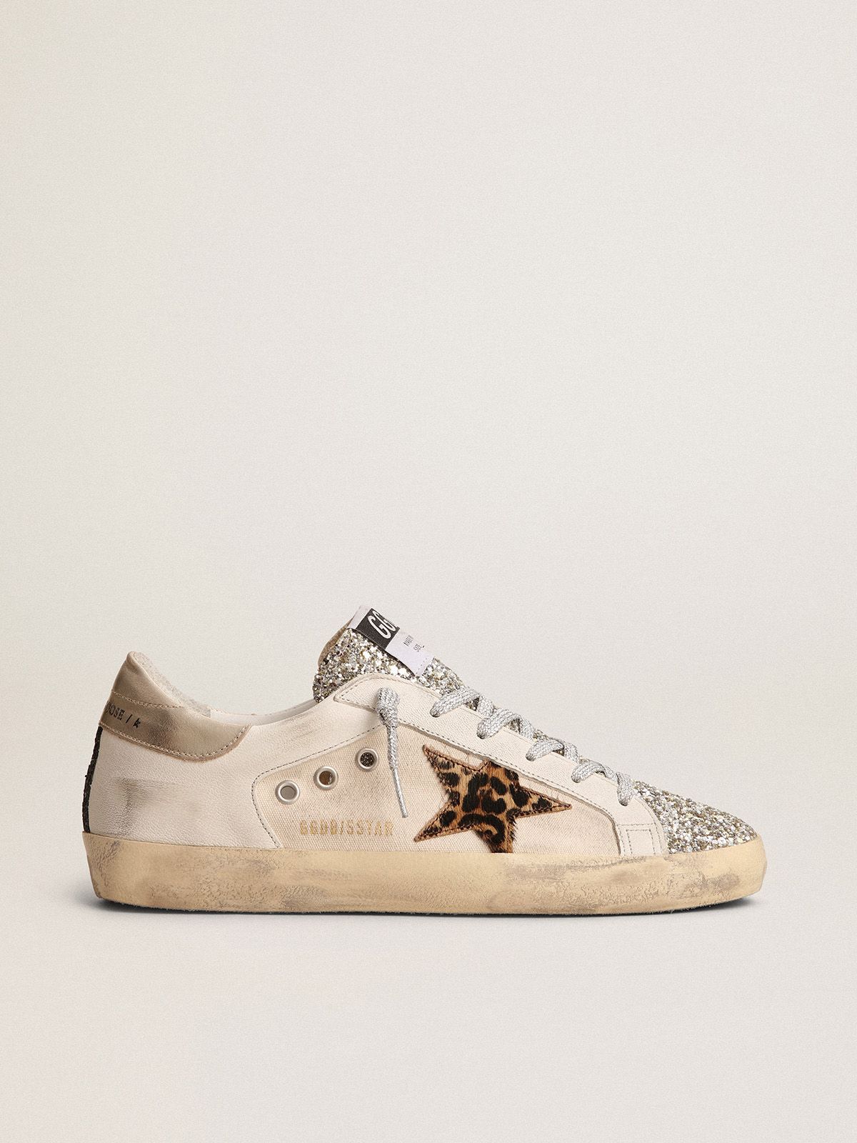 Super-Star sneakers with platinum-colored glitter tongue and leopard-print pony skin star