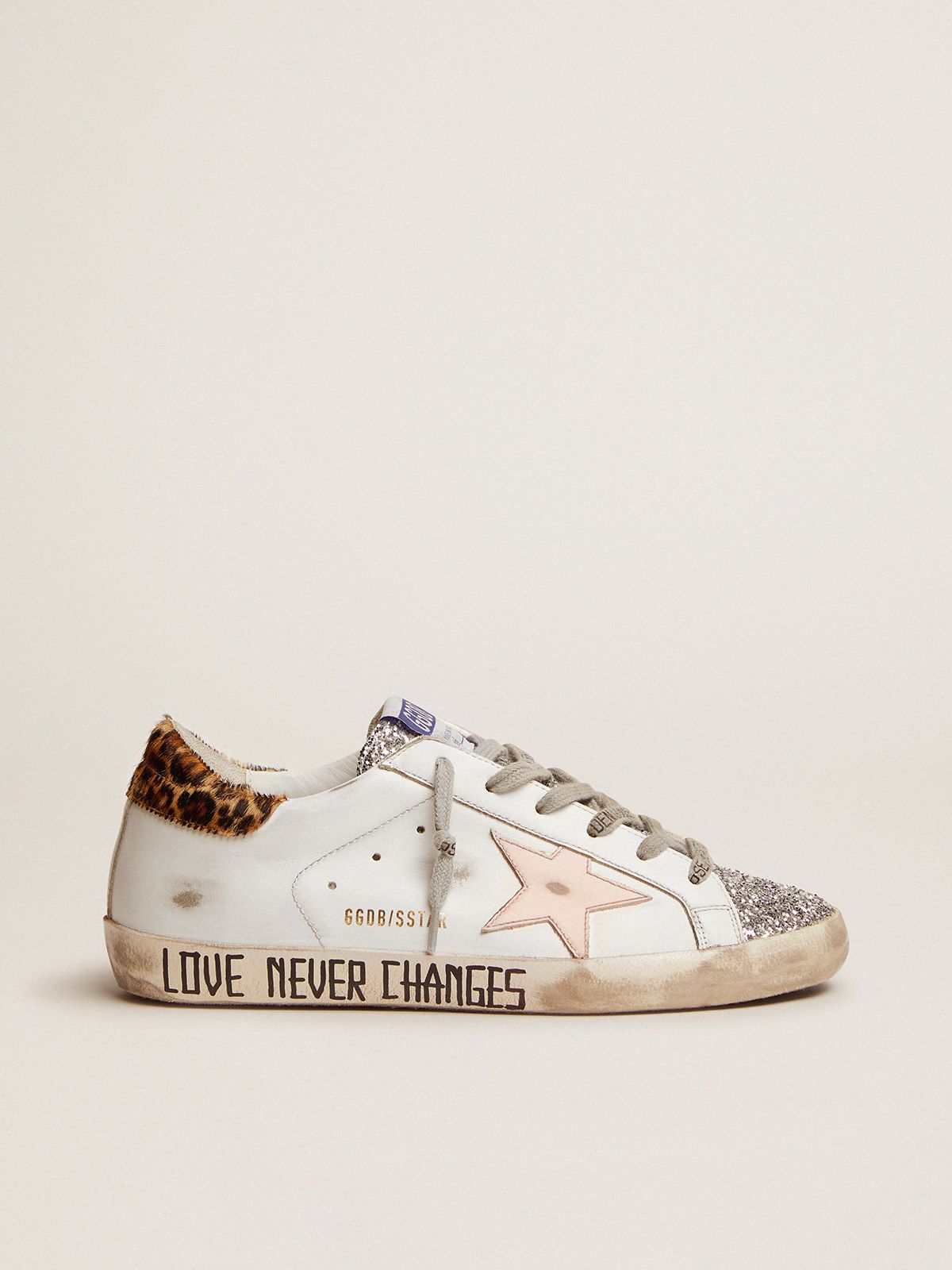 Super-Star sneakers with silver glitter tongue and handwritten lettering on the foxing
