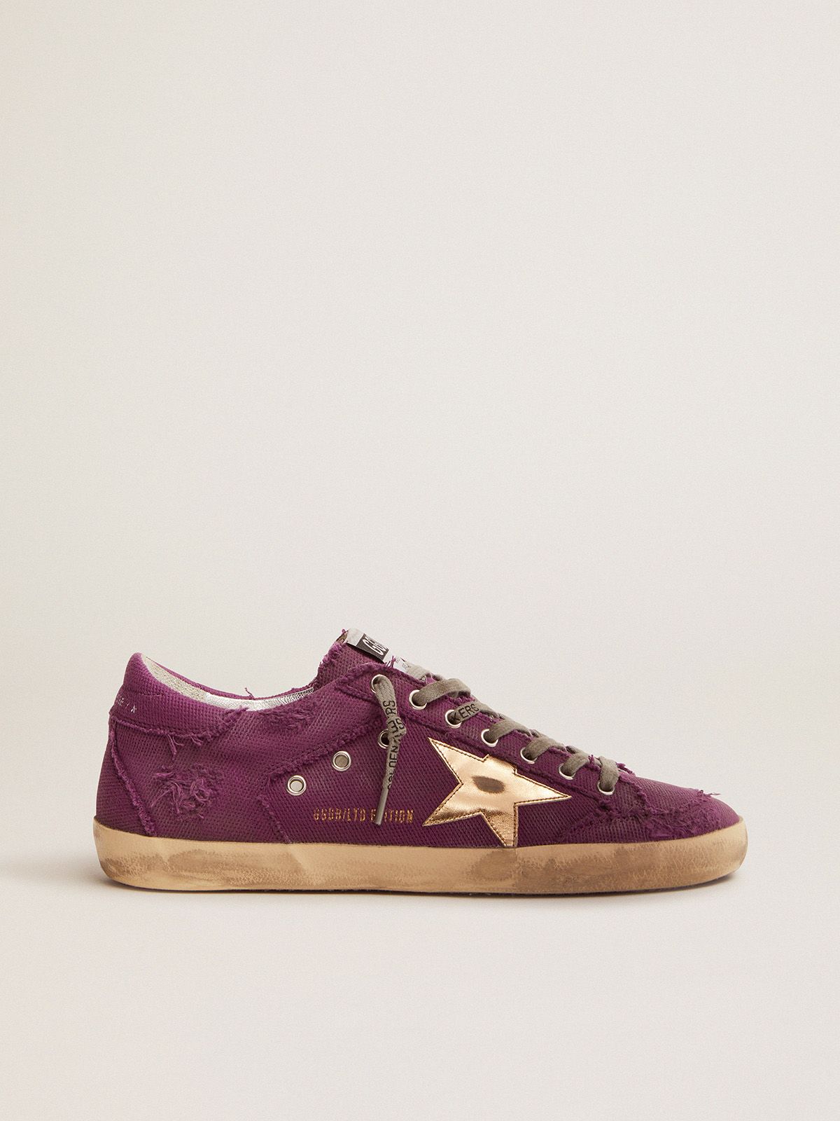 Super-Star Penstar LAB sneakers in purple distressed canvas with gold laminated leather star | 
