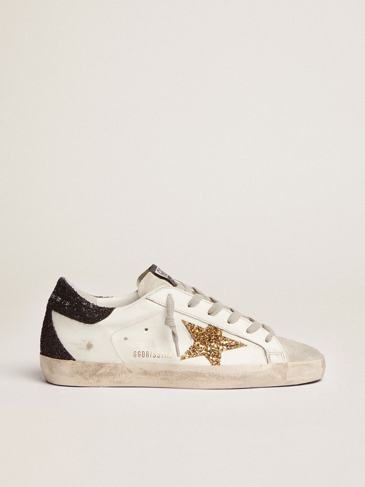 golden goose Super-Star black tab sneakers gold star with heel glittery and