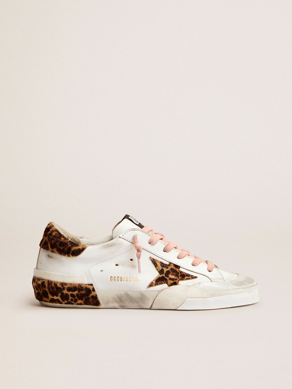 Sneakers Uomo Golden Goose Super-Star sneakers in white leather with details and multi-foxing in leopard-print pony skin