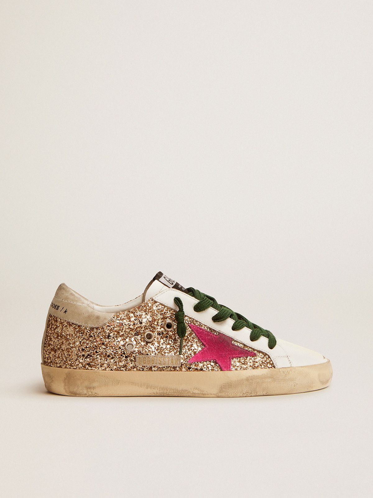 Super-Star sneakers in gold glitter with fluorescent pink suede star | 