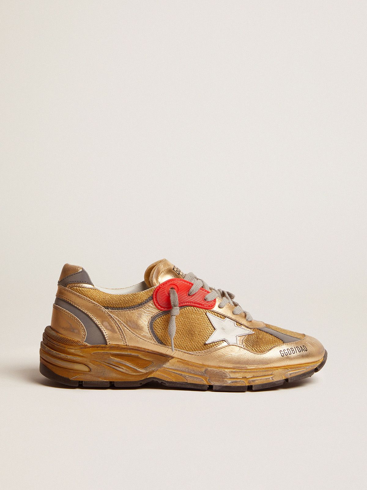 Gold Dad-Star sneakers with distressed finish | 