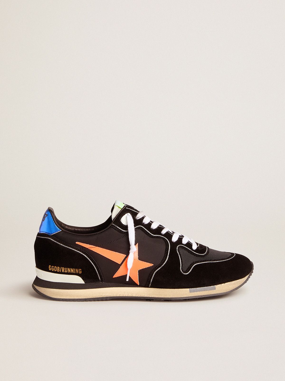 Black Running sneakers with fluorescent orange star