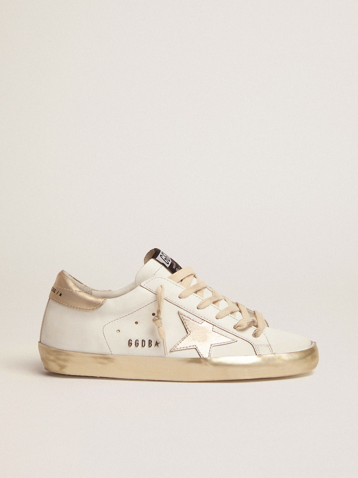 golden goose with foxing sparkle lettering metal and Super-Star gold sneakers stud