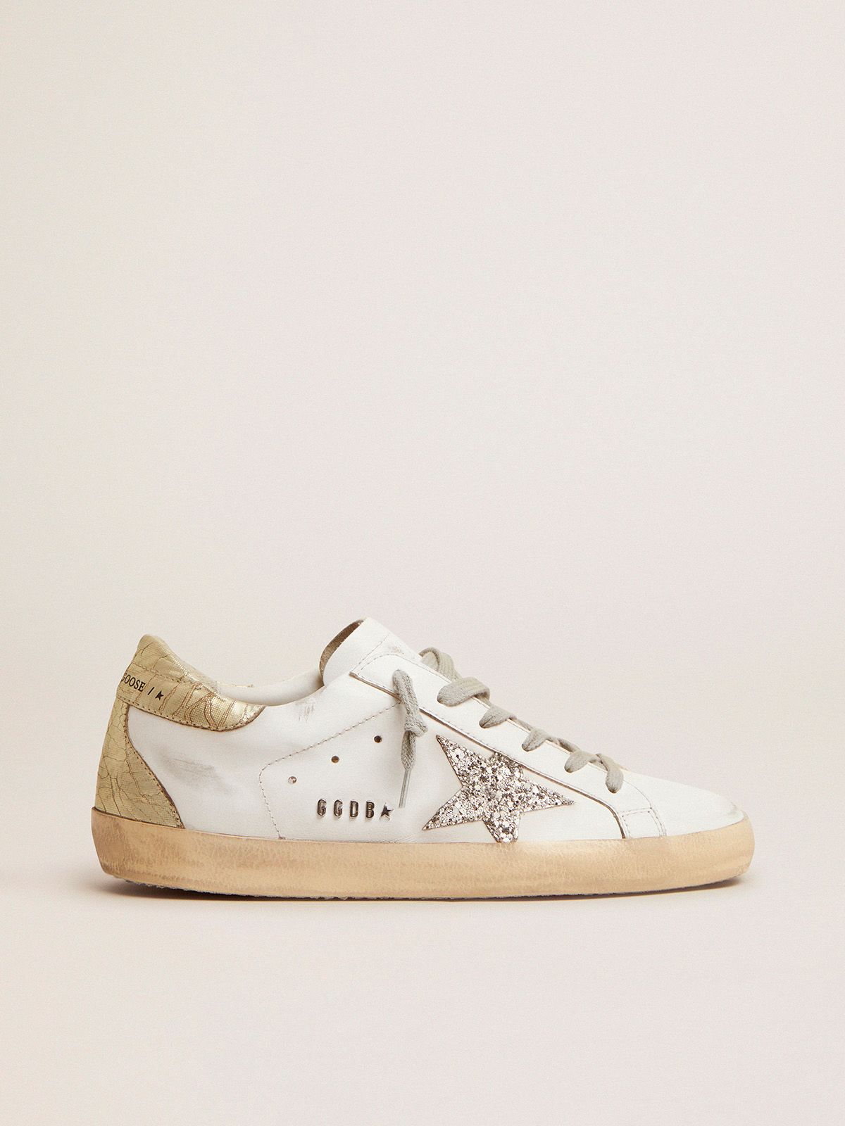 Super-Star sneakers with silver glitter star and glossy gold leather heel tab | 