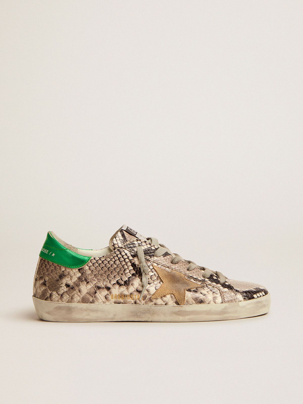 Sneakers Uomo Golden Goose Super-Star LTD sneakers with snake-print leather upper and green laminated leather heel tab