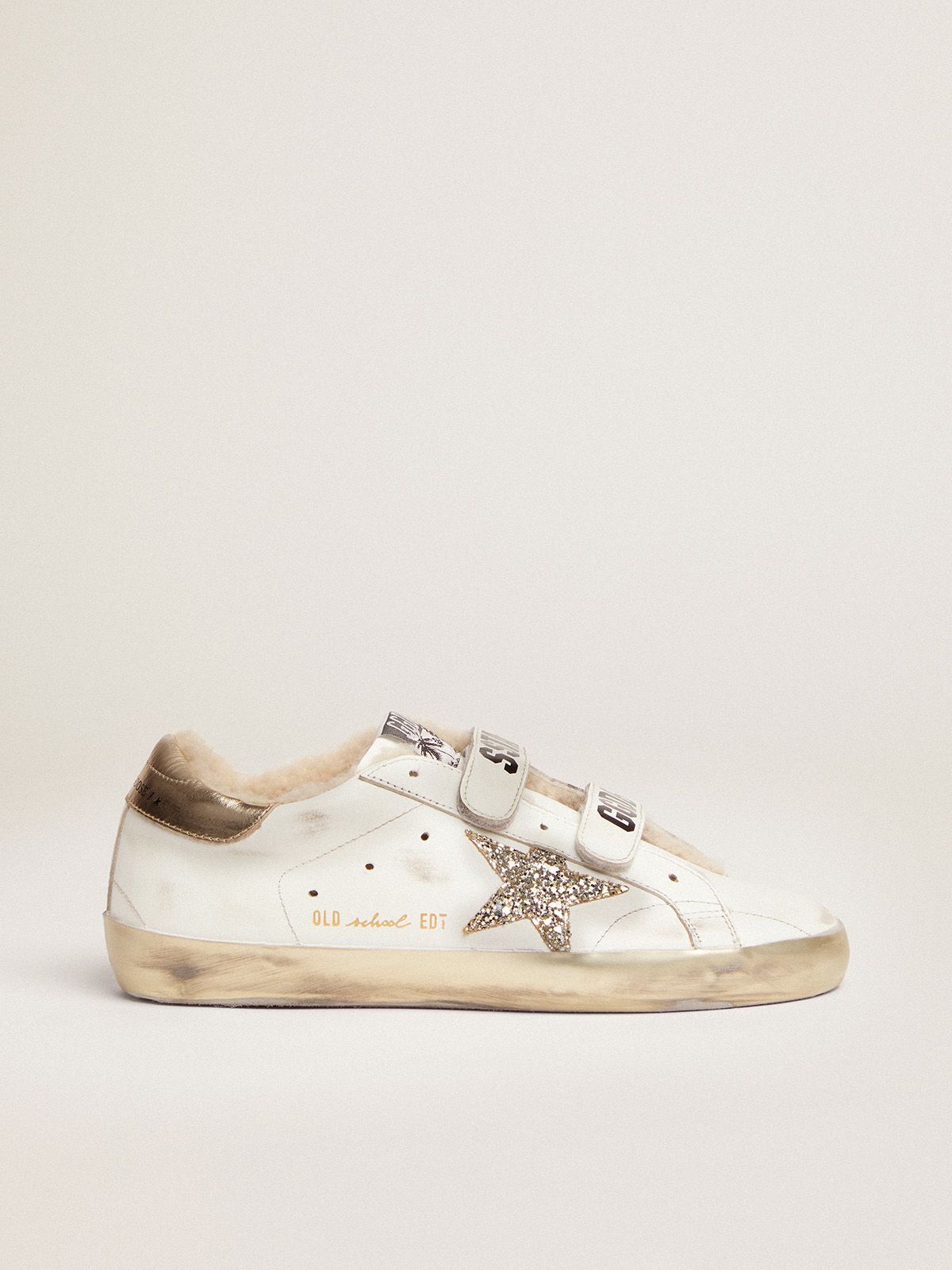 Old School sneakers in white leather with platinum-colored glitter star and shearling lining