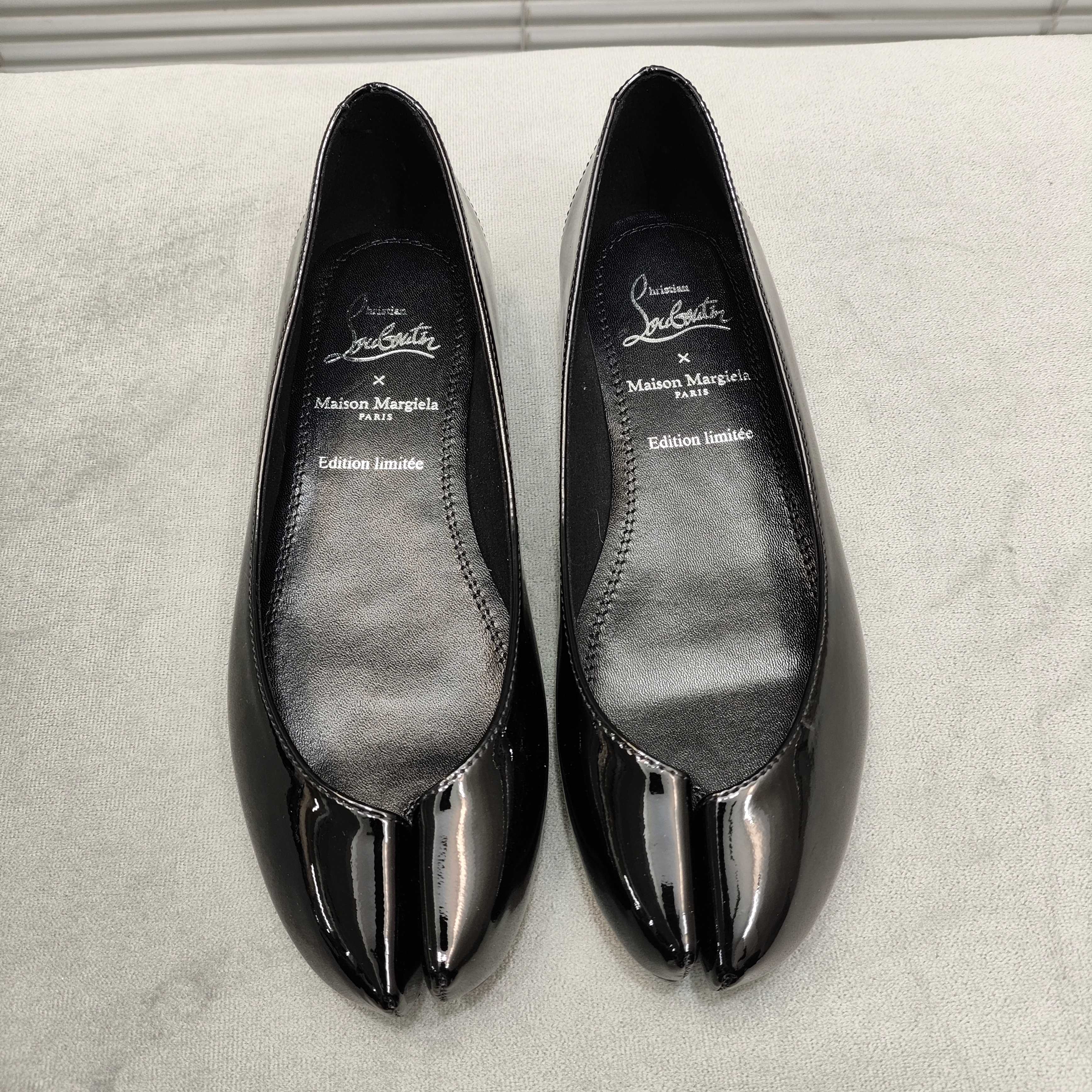 CL Christian Louboutin