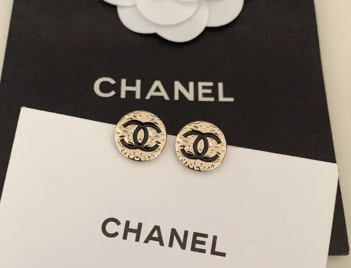 Round black double C earrings