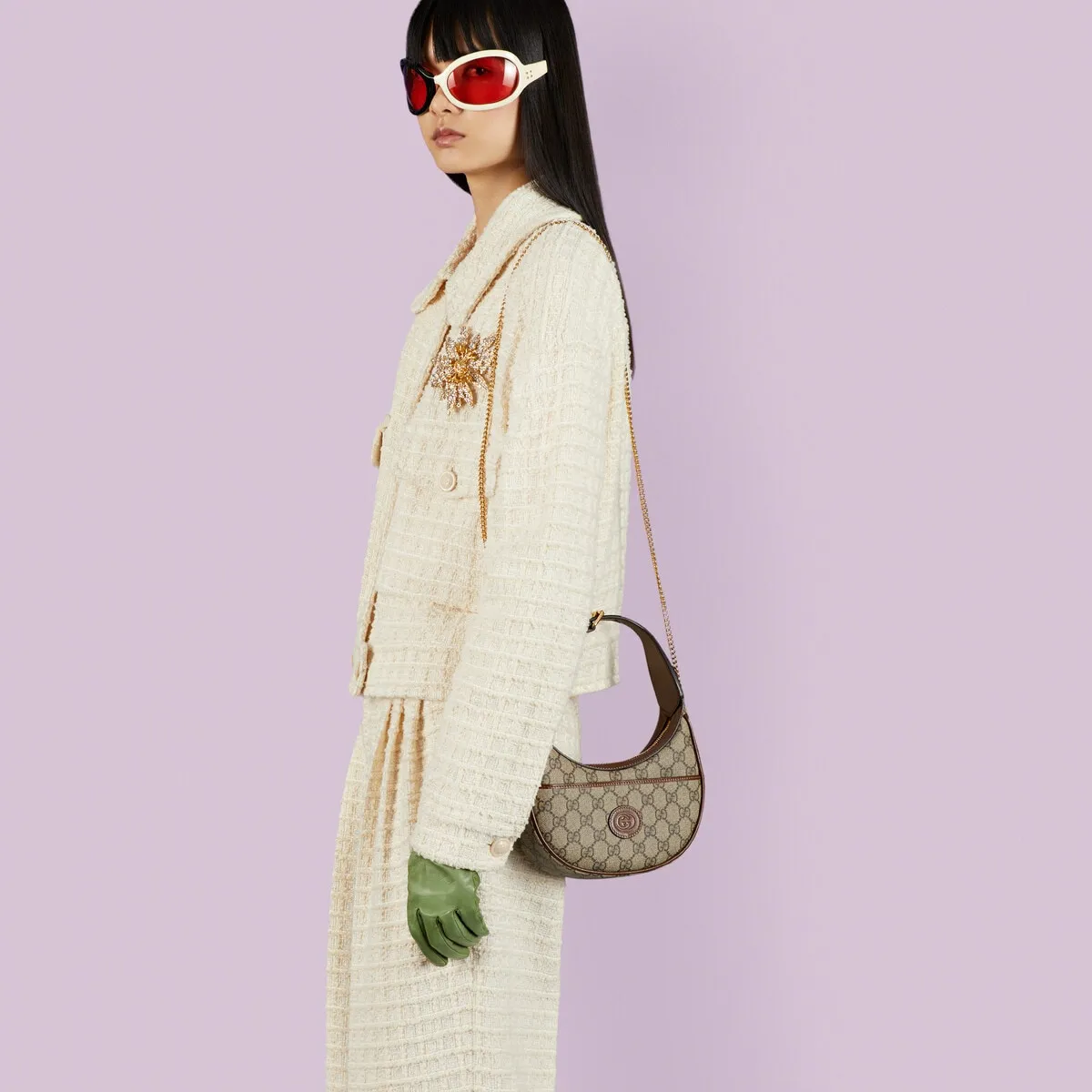 Half-moon-shaped mini bag with Interlocking