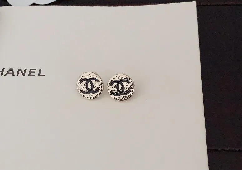 Round black double C earrings