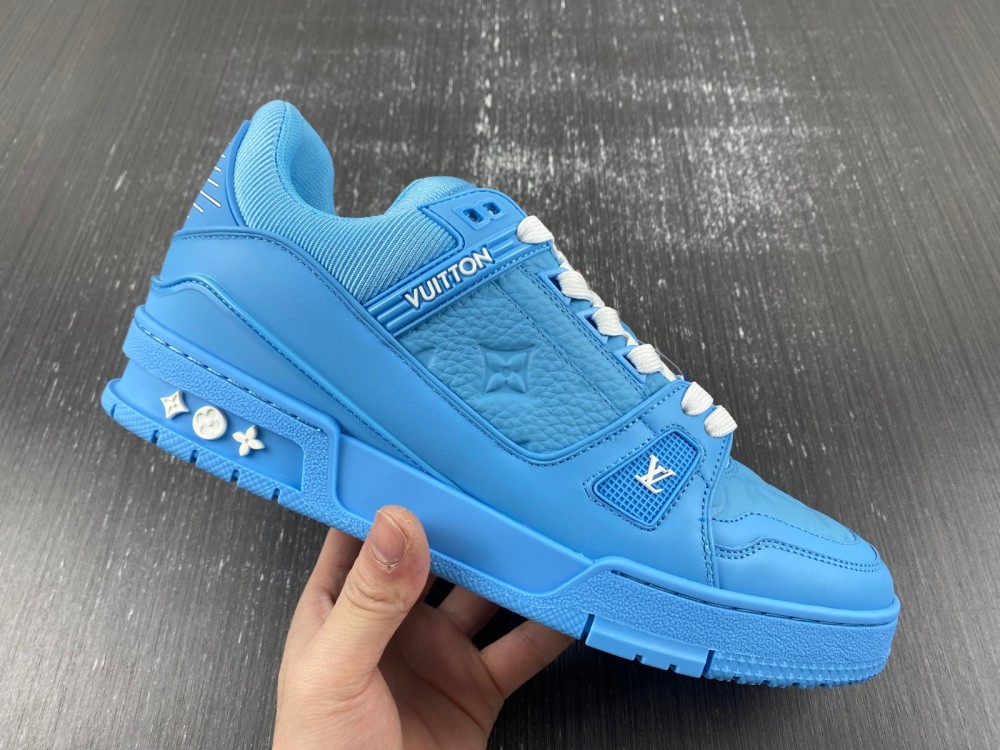 l**is V*t*n blue embossed trainer