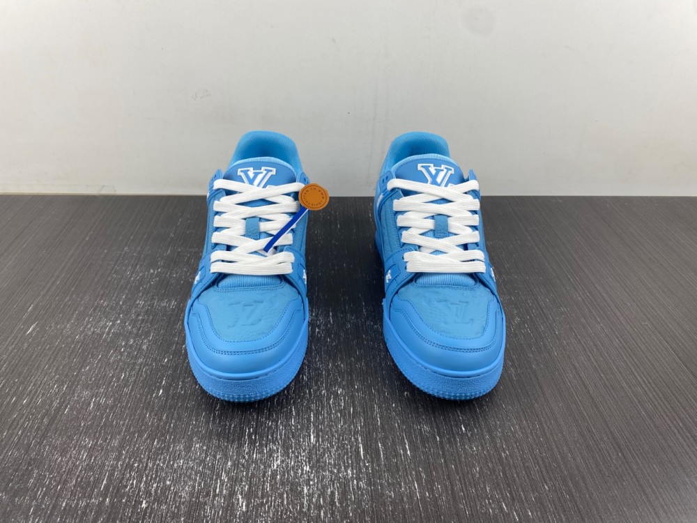 l**is V*t*n blue embossed trainer