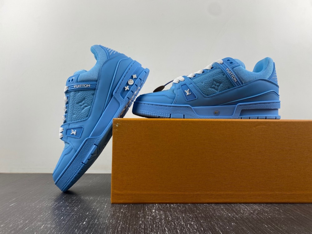 l**is V*t*n blue embossed trainer