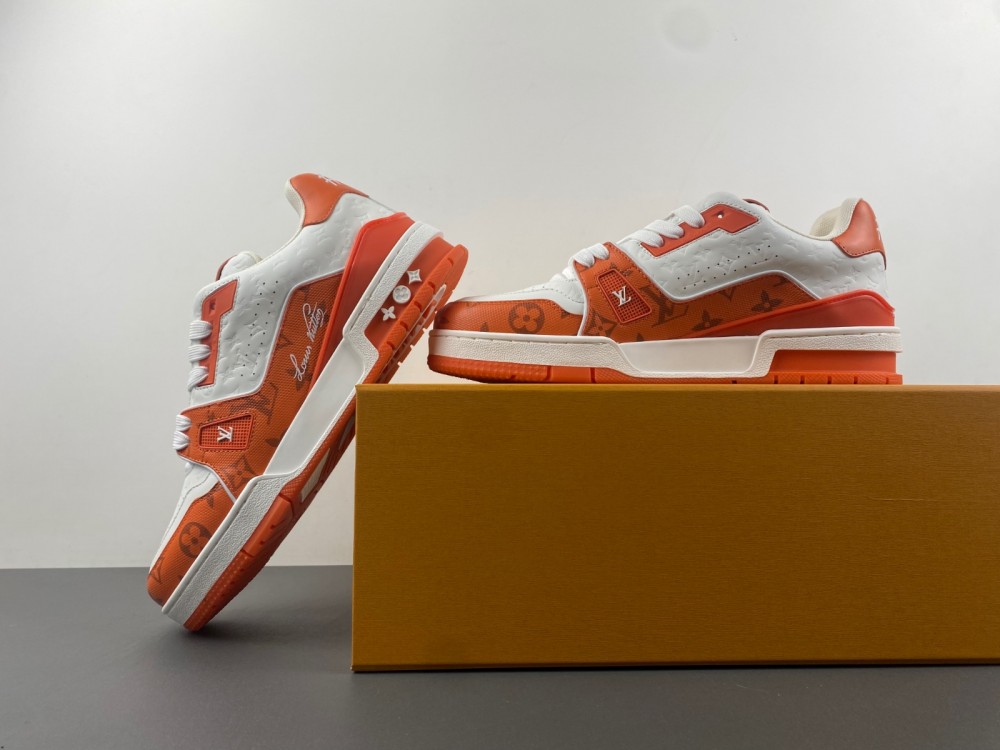 l**is V*t*n orange/white embossed trainer