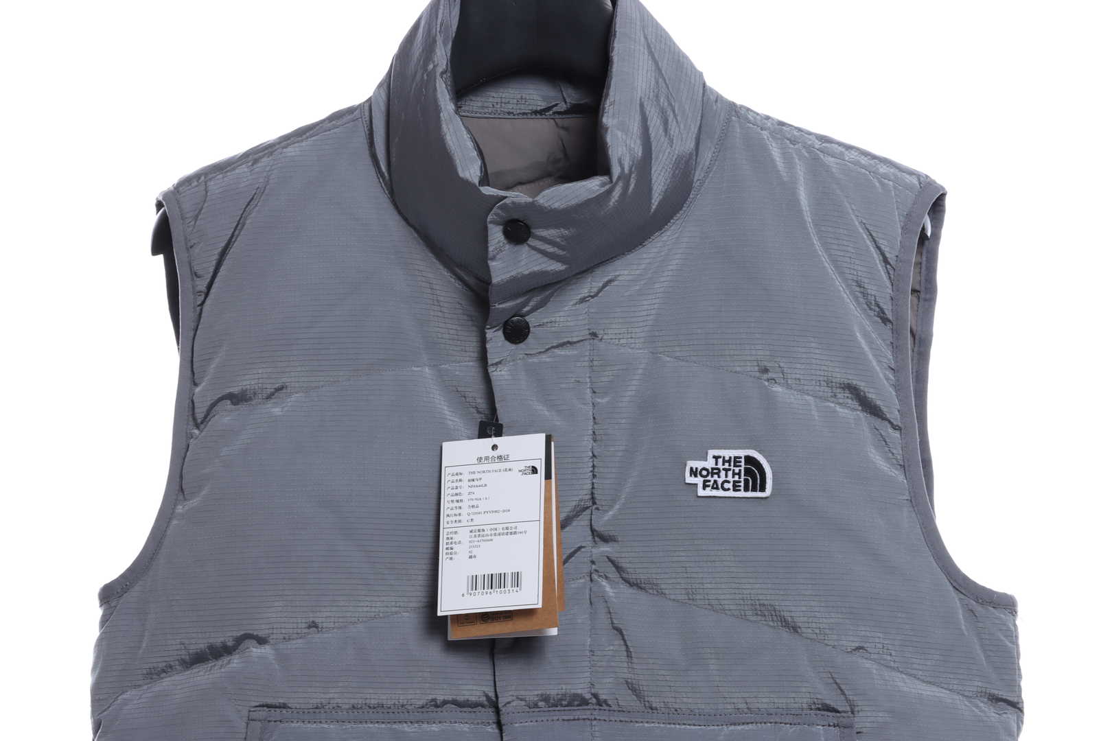 The North Face chest patch micro label down vest