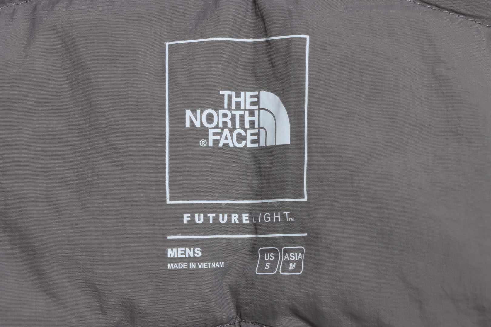 The North Face chest patch micro label down vest