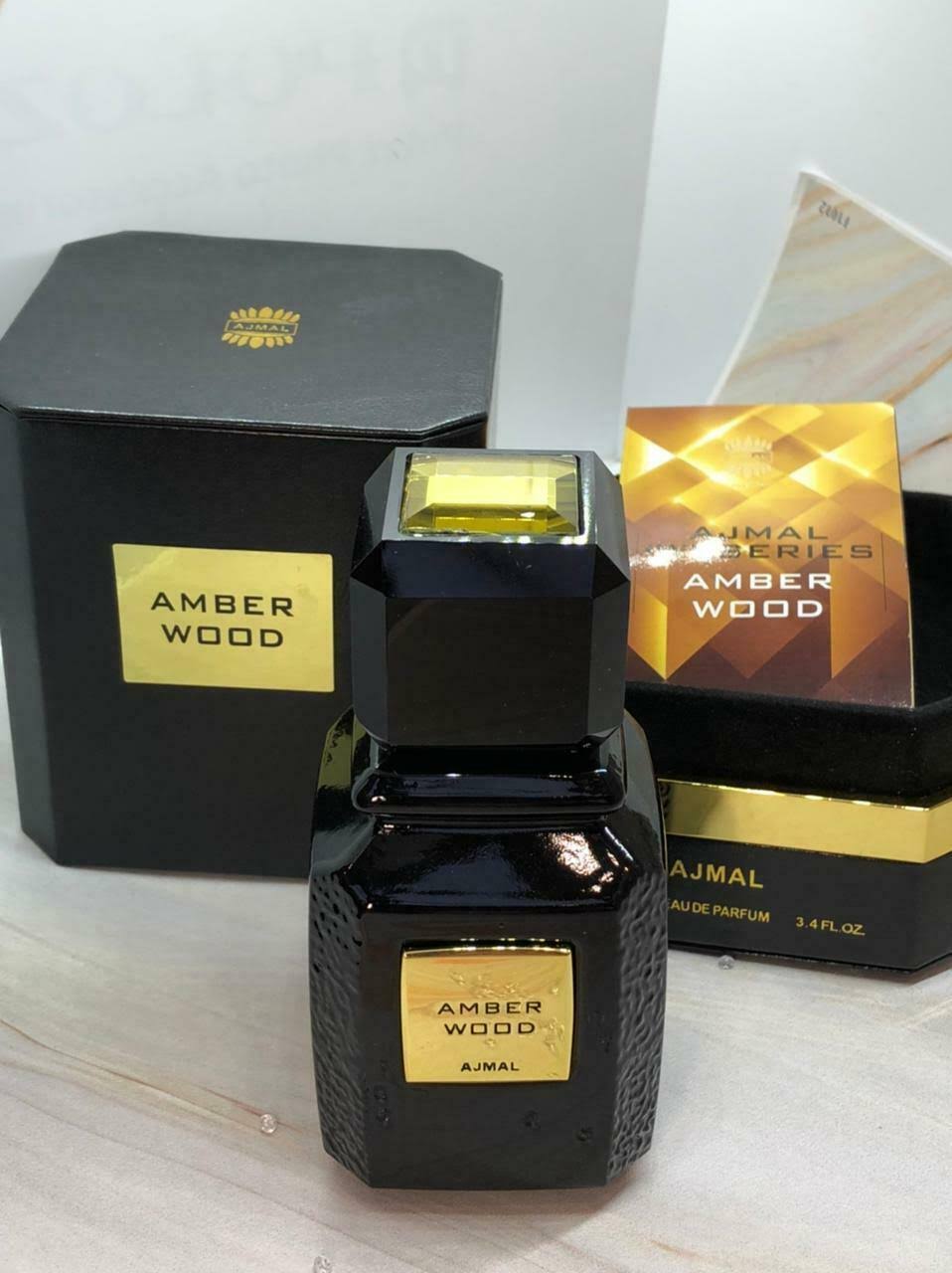 Amber Wood by Ajmal Eau De Parfum Spray 3.4 oz Unisex